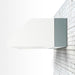 Stono Outdoor Living The TrueFlame 8" Spacer Bracket for 36" Outdoor Vent Hood (TF-VH36-2-SP8) by TrueFlame is mounted on a white brick wall, showcasing a modern, minimalist look against a clean, white background.