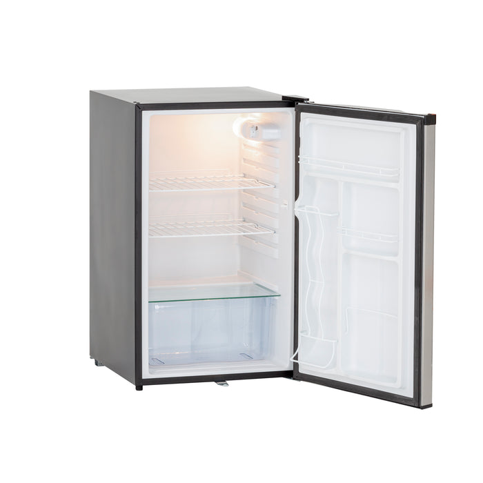 Stono Outdoor Living The TrueFlame 22" 4.1c Outdoor Approved Fridge (AMD-RFR-22S) features wire shelves, a clear bottom drawer, stainless steel reversible door with lock, and door compartments, shown open and empty against a white background.