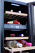 Stono Outdoor Living The TrueFlame 15" 3.2 Cu. Ft. Outdoor Rated Single Zone Wine Cooler (AMD-RFR-15W) features a stainless steel design with wooden shelves, blue LED lighting, and a digital temperature display—ideal for storing wine, cheese, and more in your outdoor kitchen.