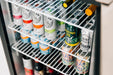 Stono Outdoor Living The TrueFlame 24" 5.3 Cu. Ft. Deluxe Outdoor Rated Refrigerator (TF-RFR-24D-R) by TrueFlame, with a stainless steel door, showcases cans like White Claw, Saint Archer IPA, and LaCroix—combining stylish storage for any outdoor space.