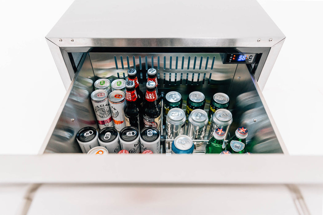 Stono Outdoor Living The TrueFlame 24" 5.1 Cu. Ft. Deluxe Outdoor Rated 2-Drawer Refrigerator keeps drinks cold at 3.6°C, with a durable stainless steel build—ideal for your backyard or patio kitchen—perfect for storing cans and bottles outdoors.