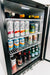 Stono Outdoor Living The TrueFlame 24" Outdoor Rated Refrigerator (5.1 cu. ft.) by TrueFlame is stocked with White Claw, Fresca, La Croix, beer, sparkling water, soda, and wine bottles—perfect to keep drinks cold for your next gathering.
