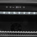 Stono Outdoor Living Close-up of the Coyote 24" Outdoor Refrigerator (C124R-S) digital display set to 34°F, showing control buttons, LED-lit interior, adjustable shelves, and visible cooling fan inside.