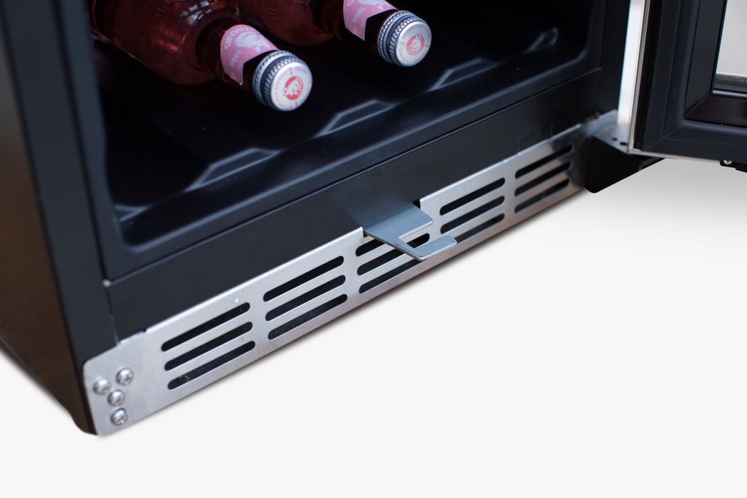 Stono Outdoor Living Close-up of the TrueFlame 15" 3.2 Cu. Ft. Outdoor Rated Refrigerator with Glass Door (AMD-RFR-15G) showing two pink-labeled bottles inside and a partially open metal vent—perfect for any outdoor kitchen.