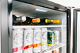 Stono Outdoor Living A TrueFlame 24" Outdoor Rated Refrigerator (Right Hinge) displays White Claw hard seltzer, an IPA beer can, and wine bottles neatly stored on its shelves.