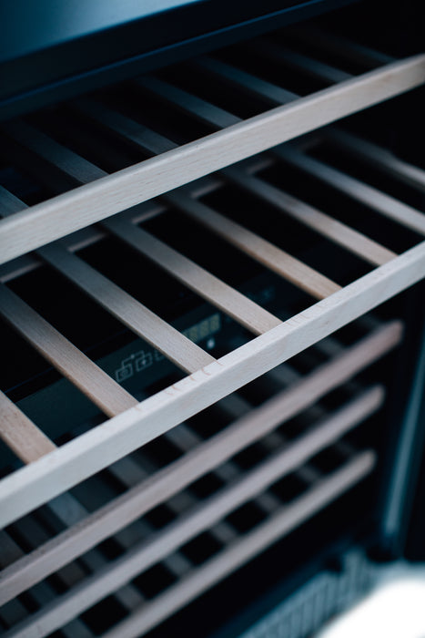 Stono Outdoor Living Close-up of wooden shelves and digital control panel inside the TrueFlame 24" 5.3 Cu. Ft. Outdoor Rated Single Zone Wine Cooler—ideal for modern outdoor kitchens and outdoor refrigeration needs.