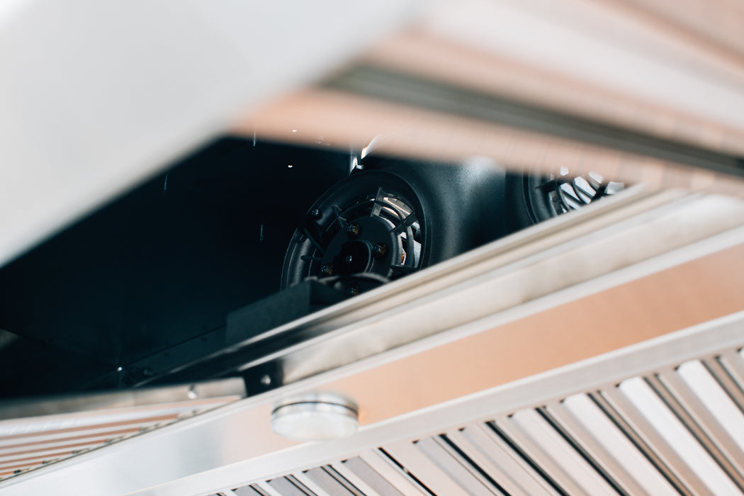 Stono Outdoor Living Close-up of the TrueFlame 36" Outdoor Vent Hood (TF-VH36-2) with stainless steel finish, visible exhaust fan, and slatted vent cover—ideal for outdoor kitchens.