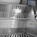 Stono Outdoor Living Close-up of the Wildfire Ranch Pro 30" Gas Grill (WFPRO30G-BSS-NG) by Wildfire Outdoor Living, featuring a black stainless steel interior with grill grate, warming rack, built-in light, and vented panels—all with a metallic finish.