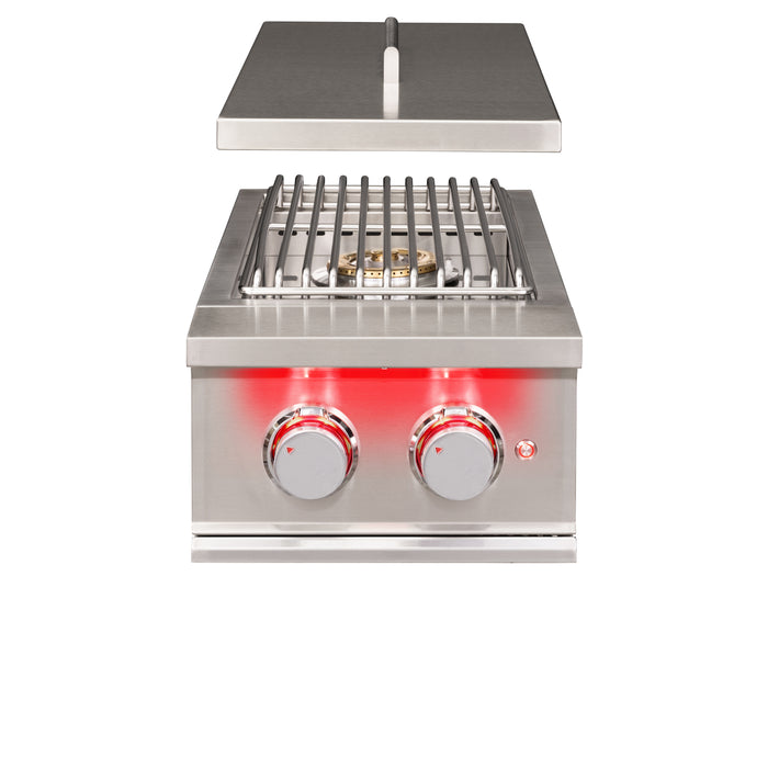 Stono Outdoor Living The TrueFlame Gas Double Side Burner - TFSB2L by TrueFlame features two red LED-lit control knobs, a metal grate, and a closed lid—perfect for outdoor kitchens. The stainless steel unit is shown from the front.