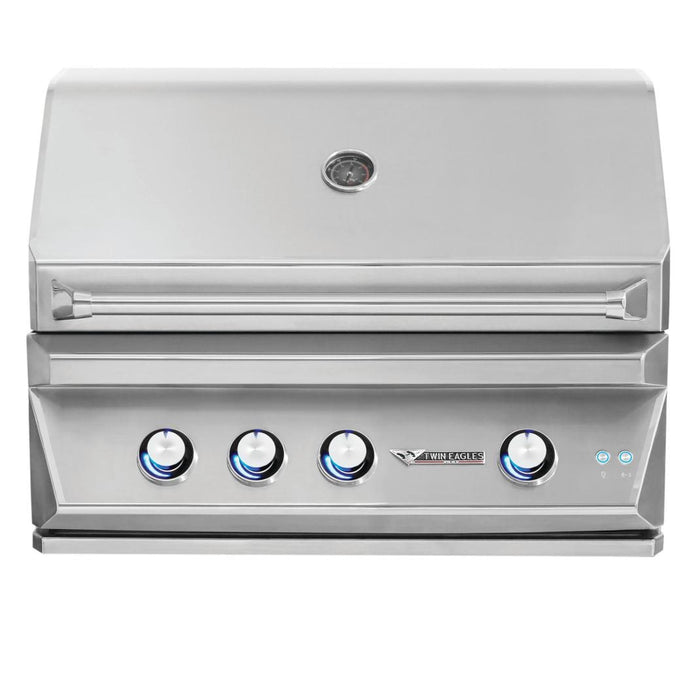 Stono Outdoor Living The Twin Eagles 30-Inch 2-Burner Built-In Propane Gas Grill (TEBQ30R-CL) features a sleek stainless steel design, stainless burners, four blue-lit control knobs, an infrared rotisserie burner, temp gauge, and a closed lid.