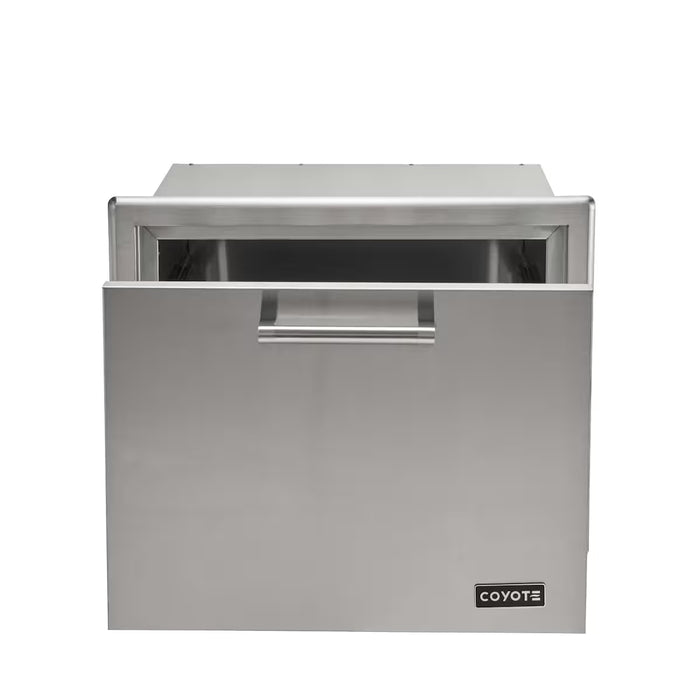 Stono Outdoor Living The Coyote 26" Pull Out Ice Chest (C3-CPOC) features a sleek handle and Coyote brand logo, making it the perfect built-in addition for outdoor kitchens or pairing with your ice storage solutions.