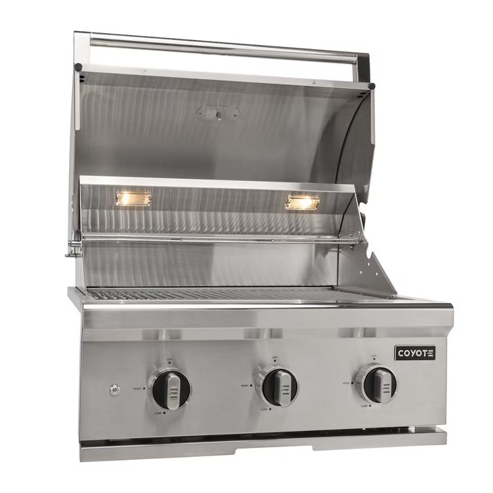 Stono Outdoor Living The Coyote 30" C-Series Grill (C3C30NG) features three burners, control knobs, a grilling surface, open hood, interior lights, and the Coyote logo—an ideal stainless steel built-in grill for any outdoor kitchen.