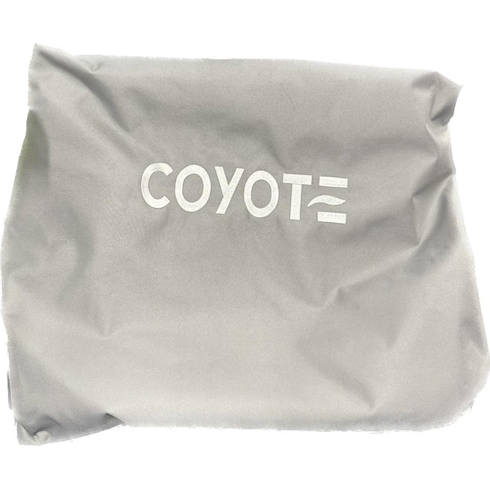 Stono Outdoor Living The Coyote Cover for 42" Grill (CCVR42-BIG) is a gray fabric bag with "COYOTE" and a stylized design in white on the front, perfect for storing grill or outdoor appliance covers. The bag has a slightly wrinkled appearance.