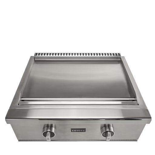 Stono Outdoor Living The Coyote 30" Flat Top Grill in Natural Gas (C3FTG30NG) features a smooth stainless steel cooking surface and two front control knobs, making it perfect for grilling in your outdoor kitchen.