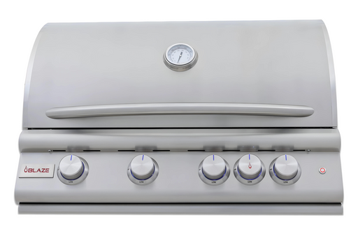 Stono Outdoor Living The Blaze Premium LTE+ Marine Grade 32" 4-Burner Propane Grill (BLZ-4LTE3MG-LP) by Blaze features a stainless steel build, rear infrared burner, grill lights, built-in thermometer, closed lid, and four front control knobs. The Blaze logo appears on the left.