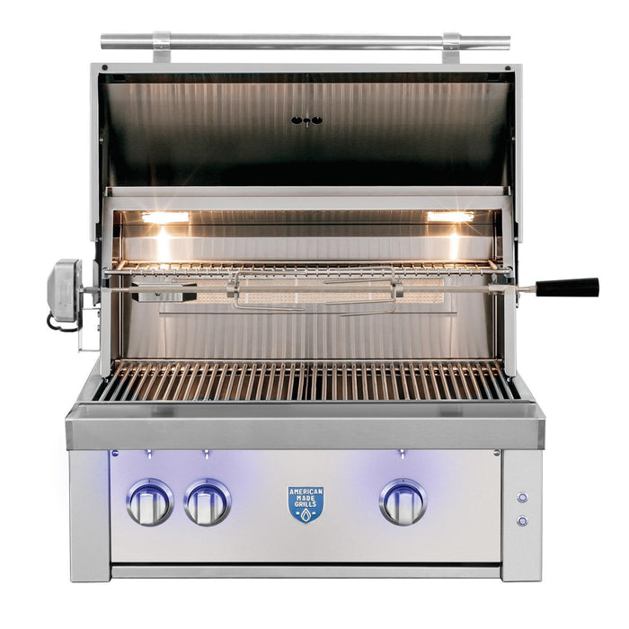 Stono Outdoor Living The American Made Grills Estate 30-Inch Grill (EST30-NG) is a luxury natural gas grill with a stainless steel finish, open lid, internal grates, rotisserie, side-mounted motor, three control knobs, and a blue-lit logo on the front panel.