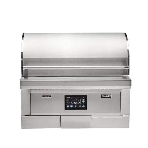 Stono Outdoor Living The Coyote 36" Pellet Grill - C2P36 is a built-in outdoor grill with advanced digital controls, a partially closed curved lid, and the Coyote logo displayed on its stainless steel front.