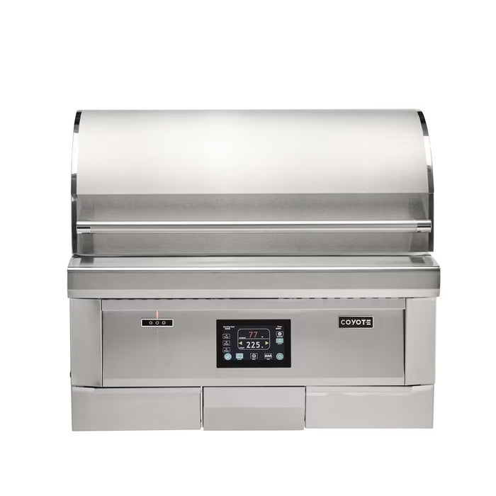 Stono Outdoor Living The Coyote 36" Pellet Grill - C2P36 is a built-in outdoor grill with advanced digital controls, a partially closed curved lid, and the Coyote logo displayed on its stainless steel front.