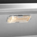 Stono Outdoor Living A close-up of a rectangular LED light with a clear cover mounted on the Twin Eagles Eagle One 54-Inch 4-Burner Built-In Natural Gas Grill with Sear Zone & Two Infrared Rotisserie Burners, softly illuminating this luxury Twin Eagles grill design.