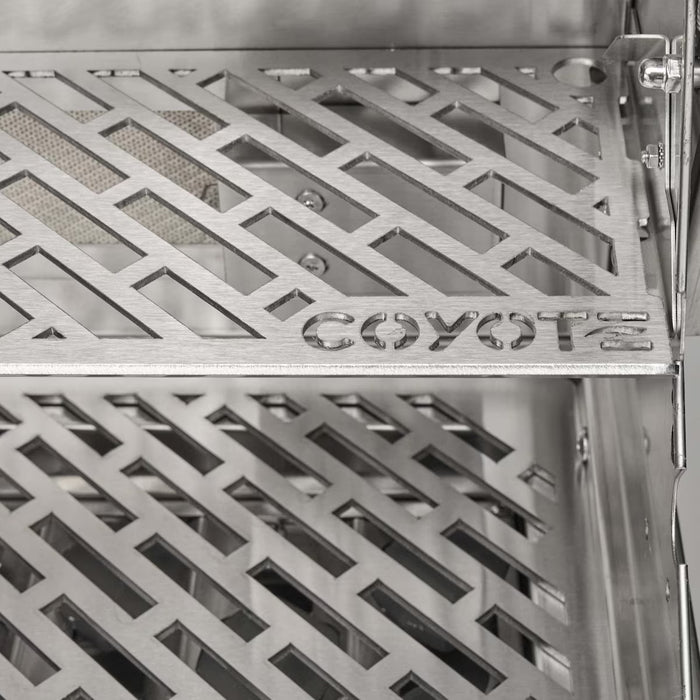 Stono Outdoor Living Close-up of Coyote 30" SL-Series Grill grates with a diamond pattern and COYOTE logo, featuring LED lights and ceramics in natural gas—ideal for outdoor kitchens or built-in setups.
