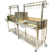 Stono Outdoor Living The Tagwood BBQ Double Argentine Santa Maria Wood Fire & Charcoal Grill (BBQ04SS) offers a modern stainless steel design on wheels, utensil hooks, open fire grill surface, rotisserie attachment, side tray, and lower storage shelf.