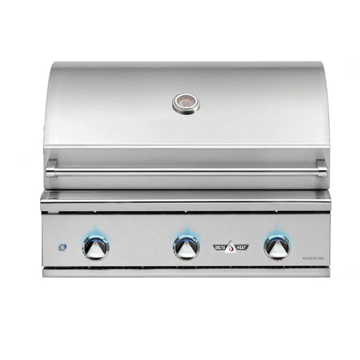 Stono Outdoor Living The Delta Heat 32-Inch 3-Burner Built-In Propane Gas Grill (DHBQ32G-DL) features a closed lid, three blue-lit knobs, a top temperature gauge, and front logo—an ideal upgrade for any outdoor kitchen.