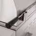Stono Outdoor Living Close-up of the American Made Grills Estate 30-Inch Grill (EST30-NG), featuring a black side handle and detailed stainless steel construction on the lid and body.