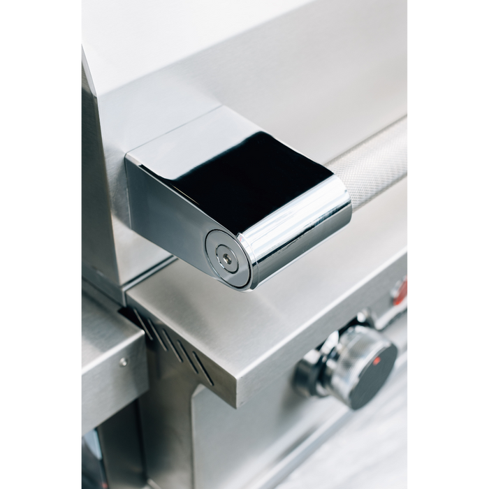 Stono Outdoor Living Close-up of the TrueFlame E Series 25" Stainless Steel 3-Burner Built-In Propane Gas Grill (TFE25L) shows its clean, reflective handle and control knob, highlighting the sleek, modern design of this commercial-grade TrueFlame grill.