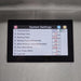 Stono Outdoor Living The Coyote 36" Pellet Grill - C2P36 features a touchscreen display that shows outdoor cooking settings like temperature, feeding time, startup time, and alarms in red and blue using advanced digital controls.
