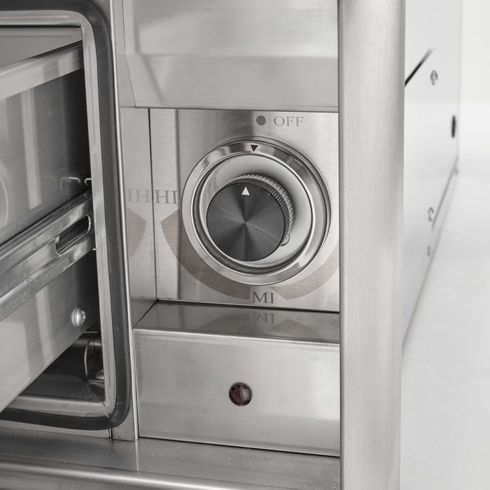 Stono Outdoor Living Close-up of the Coyote C3-WD Warming Drawer’s stainless steel control panel, featuring a round dial with OFF, HI, and MI settings. An open compartment is visible—ideal for outdoor kitchens.
