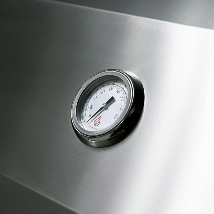 Stono Outdoor Living A close-up of a round temperature gauge on the TrueFlame 25" 3-Burner Built-In Propane Gas Grill - TF25L, featuring Fahrenheit and Celsius readings—perfect for any high-performance grill setup by TrueFlame.