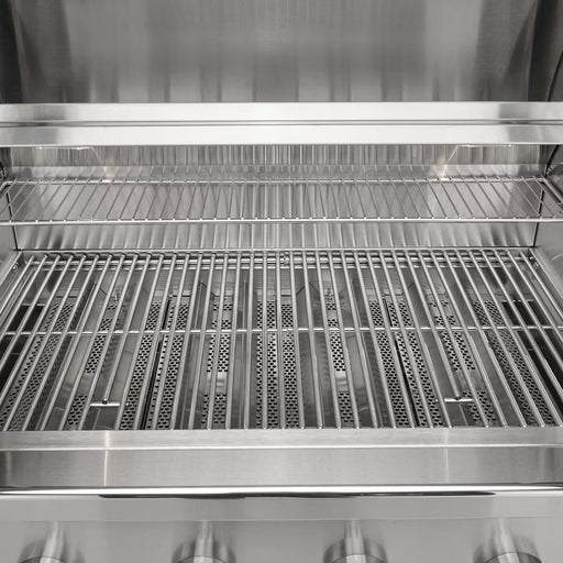 Stono Outdoor Living A close-up of the Coyote 42" CL-Series Grill (C3CL42NG) shows its clean stainless steel design, wide cooking grates, warming rack, and easy-access control knobs—ideal for any modern outdoor kitchen.