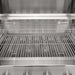 Stono Outdoor Living Close-up of the Coyote 36" CL-Series Grill, 4 Burner in Propane (C3CL36LP) by Coyote, featuring dual grilling racks and control knobs. Its modern, sleek stainless steel design is clean and ideal for outdoor cooking.