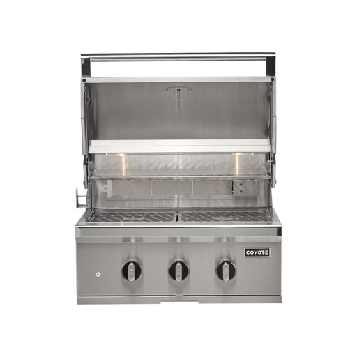 Stono Outdoor Living The Coyote 30" SL-Series Grill (C3SL30NG) is a stainless steel built-in natural gas grill with LED lights, ceramics, three control knobs, the Coyote logo, and an open lid showing the grilling surface—ideal for outdoor kitchens and safe grilling.