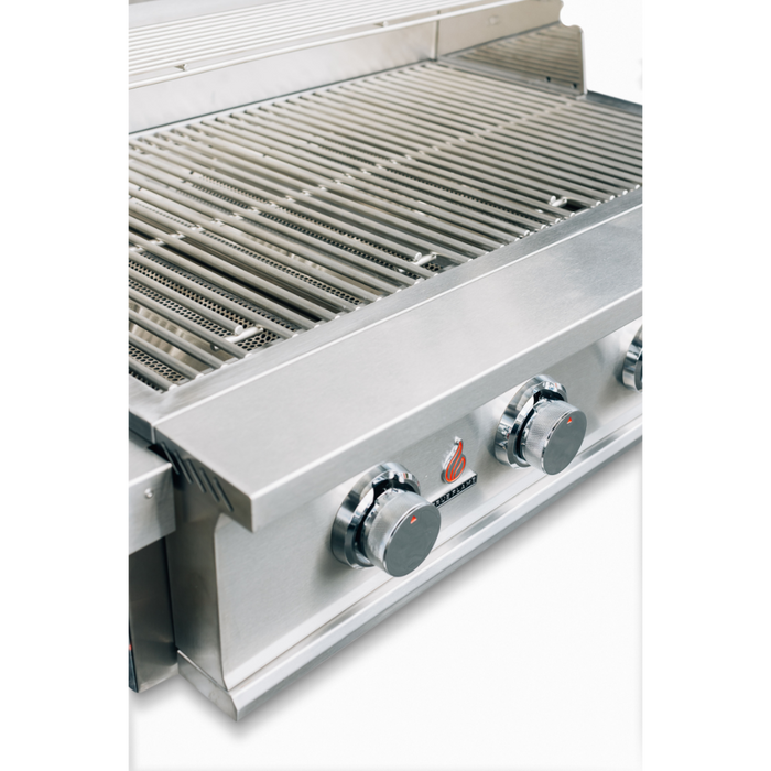 Stono Outdoor Living A close-up of the TrueFlame E Series 32" Stainless Steel 4-Burner Built-In Propane Gas Grill (TFE32L) by TrueFlame, featuring four control knobs and a metal grate in durable 304 stainless steel for a sleek, commercial-grade appearance.