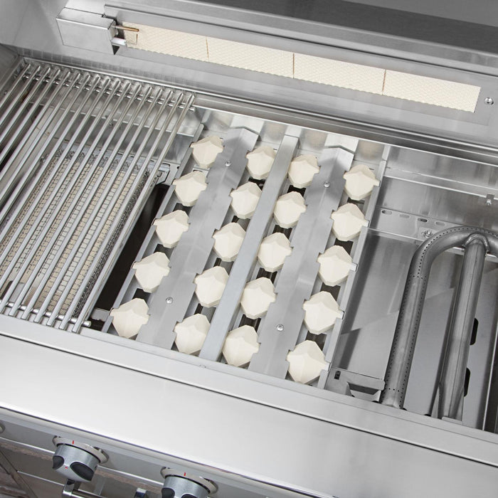 Stono Outdoor Living Close-up of the Delta Heat 32-Inch DHBQ32RS-DL gas grill interior, featuring metal grates, ceramic briquettes, burners, control knobs, and both a sear zone and infrared rotisserie burner in this stainless steel built-in grill.