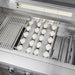 Stono Outdoor Living Close-up of the Delta Heat 32-Inch DHBQ32RS-DL gas grill interior, featuring metal grates, ceramic briquettes, burners, control knobs, and both a sear zone and infrared rotisserie burner in this stainless steel built-in grill.