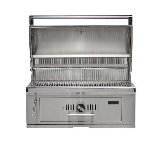 Stono Outdoor Living The Coyote 36" Charcoal Grill, Built-in - C3CH36 is a stainless steel grill with dual cooking grates, a hood, and front control knob. This outdoor-ready Coyote grill is clean and perfect for cooking.