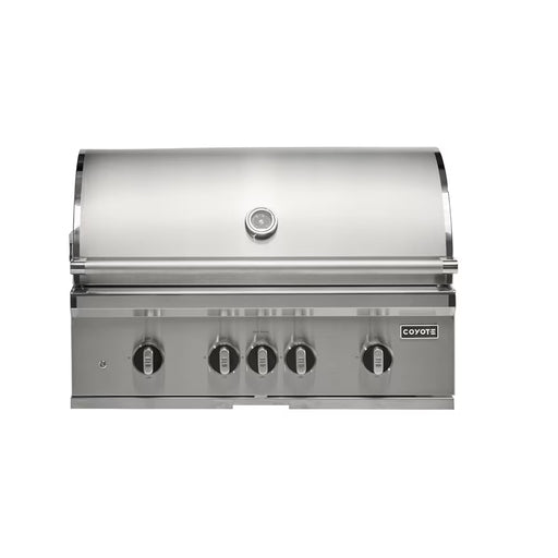 Stono Outdoor Living The Coyote 36" SL-Series Grill (C3SL36NG) is a premium built-in natural gas grill for outdoor kitchens, featuring four control knobs, LED lights, ceramic components, and a lid-mounted temperature gauge. The closed lid displays the Coyote brand logo.