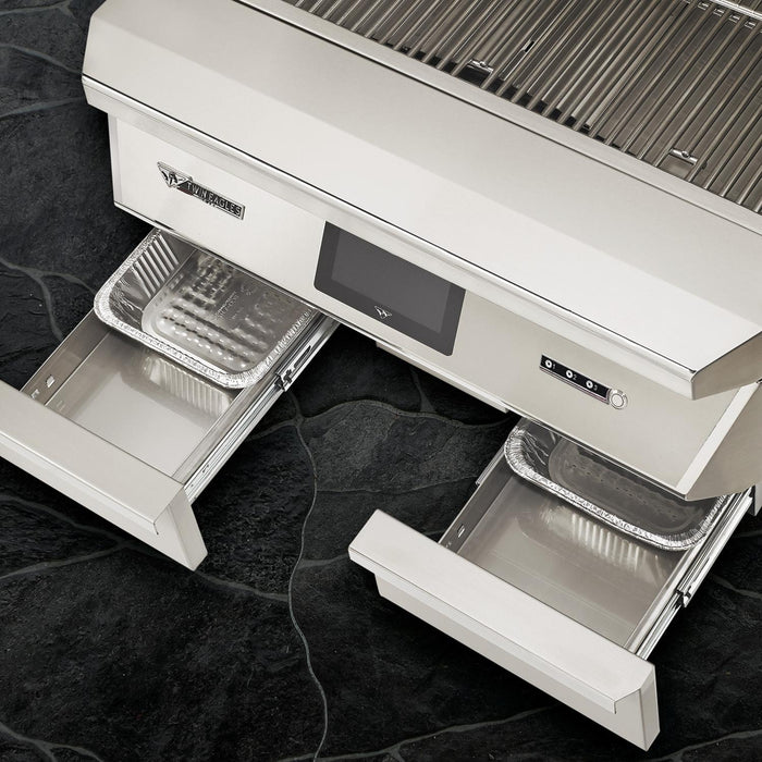 Stono Outdoor Living The Twin Eagles Wi-Fi Controlled 36-Inch Built-In Stainless Steel Pellet Grill and Smoker with Rotisserie (TEPG36R) features two open drawers with foil trays, a digital display, and control buttons set against a dark stone surface.