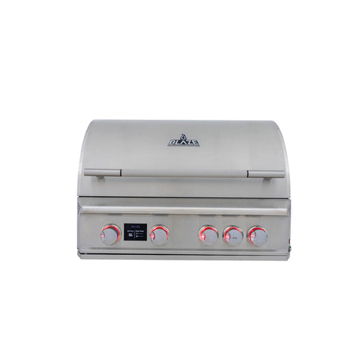 Stono Outdoor Living The Blaze LTE PRO 32-Inch 4-Burner Built-in Natural Gas Grill by Blaze, featuring a digital temperature screen and rear infrared burner, is shown with red-lit control knobs and a closed lid—ideal for high-performance grilling.