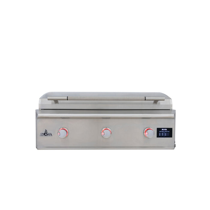 Stono Outdoor Living The Blaze LTE PRO 40-Inch Built-in Propane Gas Griddle (BLZ-GRIDDLE40-LP) features a stainless steel body, three digital control knobs with red lights, a lift-assist lid, the Blaze logo on the front panel, and precise temperature controls.