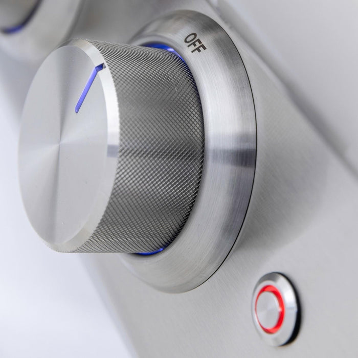 Stono Outdoor Living A close-up of a Blaze Premium LTE+ 32" 4-Burner Grill's metallic control knob set to OFF, featuring a textured grip, illuminated blue line, and a small red-outlined round button on the sleek stainless steel panel.
