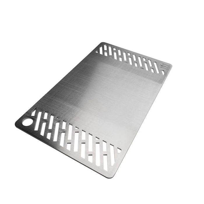 Stono Outdoor Living The Coyote Signature Griddle Grate for C3C30 (C3CSIGRATE30G) is a rectangular stainless steel grate with diagonal end slots, a corner hole, and griddle-style design—ideal for versatile cooking—shown on a white background.