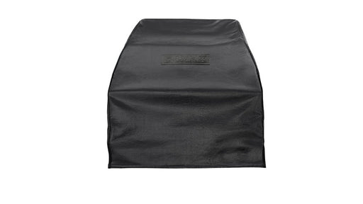 Stono Outdoor Living A black, textured rectangular cover with slightly curved sides and "TMAX" embossed in the center, the Lynx Napoli Outdoor Oven™ Carbon Fiber Vinyl Cover (countertop) - CCLPZA by Lynx protects your outdoor oven. Shown on a plain white background.