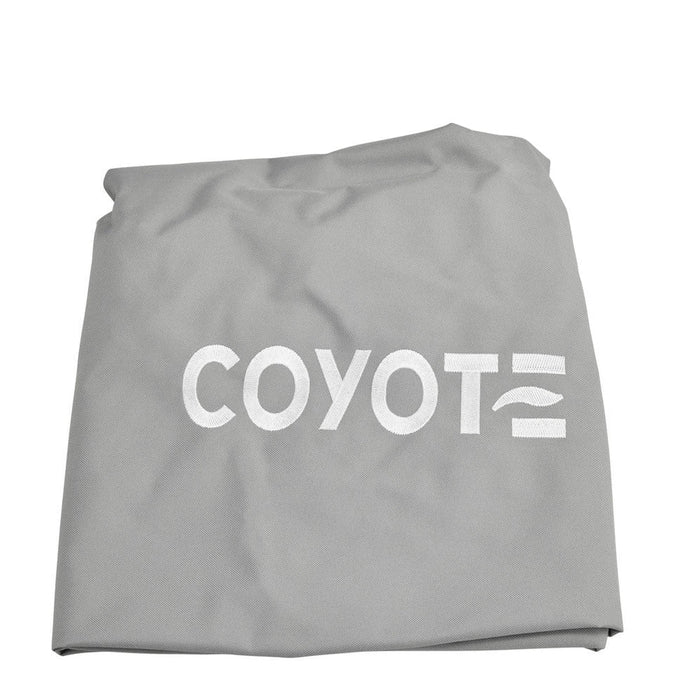 Stono Outdoor Living The Coyote Cover for 28" Built-In Pellet Grill (Gray, CCVR28P-BIG) is a weather-resistant gray fabric cover with the word COYOTE and a stylized logo printed in white on its surface.
