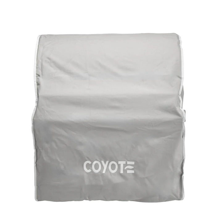 Stono Outdoor Living A gray, weather-resistant Coyote Cover for 28" Built-In Pellet Grill (CCVR28P-BIG) with “COYOTE” in white on the front, fitted over a rectangular object.