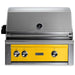 Stono Outdoor Living The Lynx 30" Built-In Grill w/ Rotisserie in California Poppy (L30R-3-CALP) features ceramic burners, a built-in thermometer, three control knobs, a partially open lid, and shows the Lynx logo above the yellow front panel.