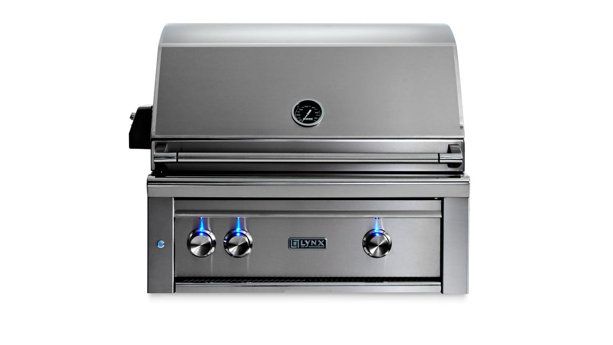 Stono Outdoor Living The Lynx 30" Built-In Grill (L30TR-LP) features stainless steel, three blue-lit knobs, a hood temperature gauge, front Lynx logo, Trident™ Infrared Burner, rotisserie, and is shown on a plain white background—ideal for outdoor cooking.