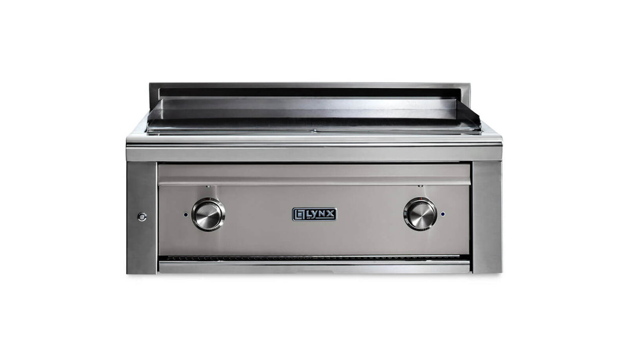 Stono Outdoor Living The Lynx 30” Asado Built-In Grill in Limestone (L30AG-LSNG), featuring two control knobs, a flat grill surface, and backsplash, is displayed against a white background—ideal for luxury outdoor kitchens.